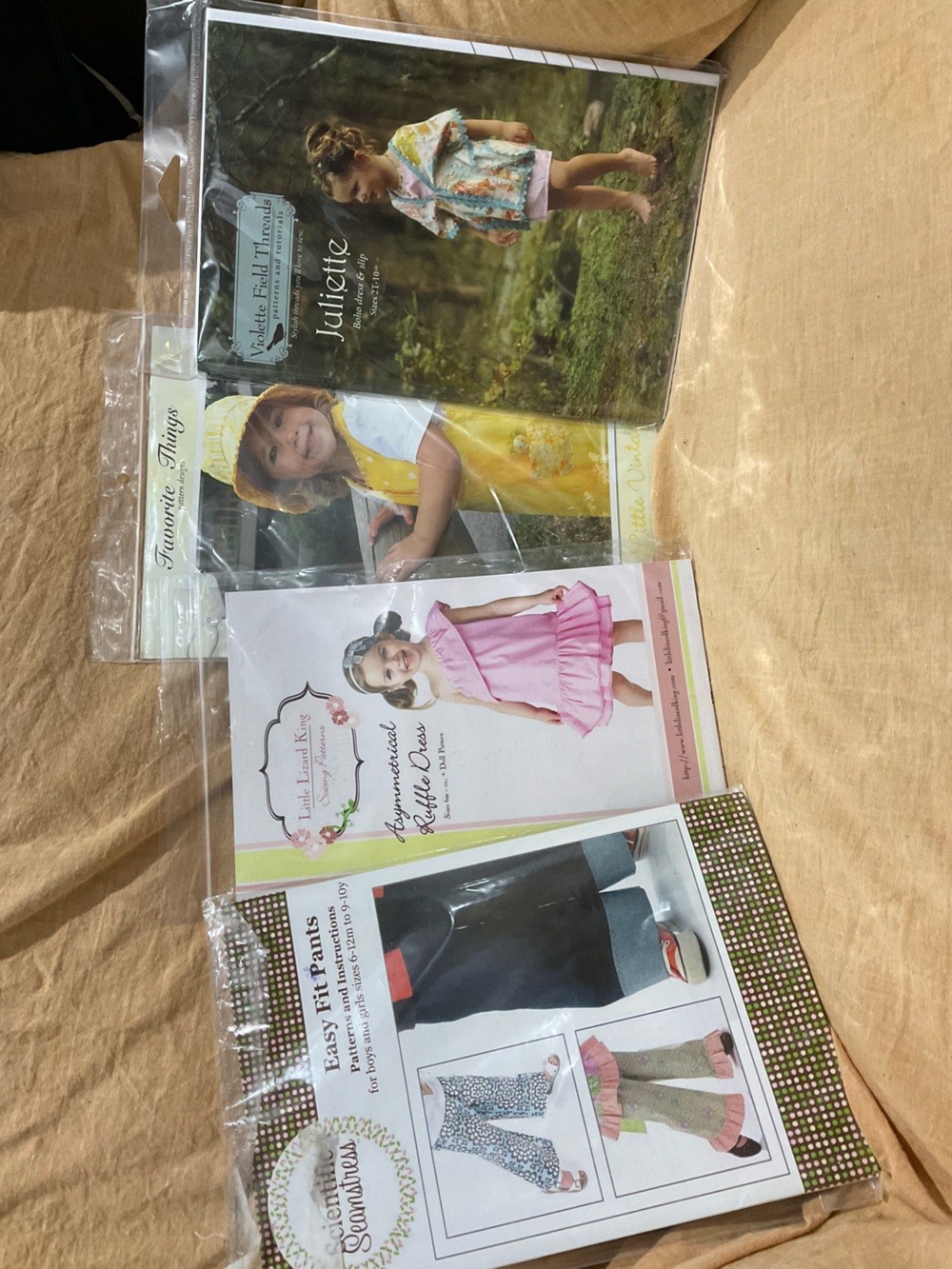 Lot of 4 children’s indy sewing patterns uncut, pants-dresses-dolls